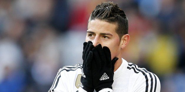 Real Madrid's James Rodriguez reacts during a Spanish La Liga soccer match between Real Madrid and Real Sociedad at the Santiago Bernabeu stadium in Madrid, Spain, Saturday Jan. 31, 2015. (AP Photo/Paul White)