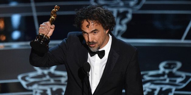 Alejandro G. Inarritu accepts the award for best director for âBirdman or (The Unexpected Virtue of Ignorance)â at the Oscars on Sunday, Feb. 22, 2015, at the Dolby Theatre in Los Angeles. (Photo by John Shearer/Invision/AP)