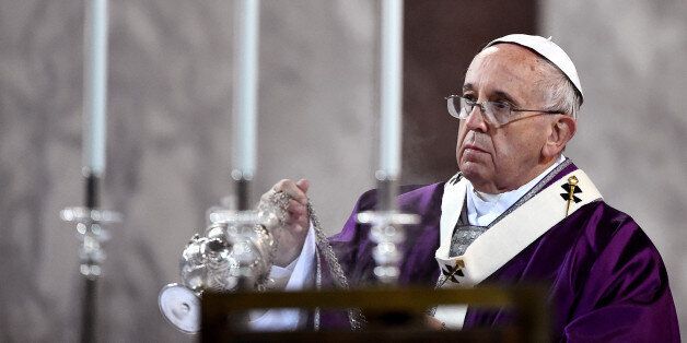 Pope Francis leads the Ash Wednesday mass at the Santa Sabina Basilica, in Rome, Wednesday, Feb. 18, 2015. The Ash Wednesday marks the beginning of Lent, a solemn period of 40 days of prayer and self-denial leading up to Easter. (AP Photo/Gabriel Bouys, pool)