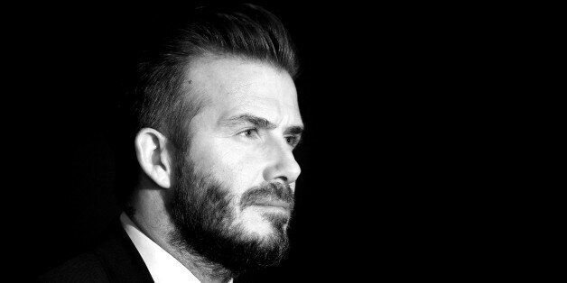 LONDON, ENGLAND - FEBRUARY 09: (EDITORS NOTE: Image has been converted to black and white.) David Beckham attends a photocall as he celebrates 10 years as a UNICEF goodwill ambassador. He also announced the launch of 7: The David Beckham UNICEF Fund to protect millions of children around the world from danger at Google HQ on February 9, 2015 in London, England. (Photo by Karwai Tang/WireImage)