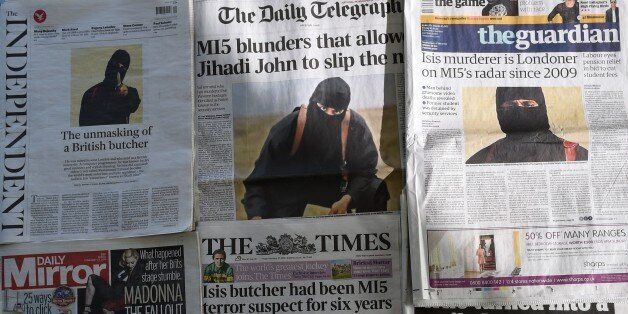 An arrangment of British daily newspapers photographed in London on February 27, 2015 shows the front-page headlines and stories regarding the identification of the masked Islamic State group militant dubbed 'Jihadi John'. The British headlines were dominated on Febryary 27 by the story of the identification of the Islamic State executioner. 'Jihadi John', the masked Islamic State group militant believed responsible for beheading of at least five Western hostages, has been named as Kuwaiti-born computing graduate Mohammed Emwazi from London. AFP PHOTO / DANIEL SORABJI (Photo credit should read DANIEL SORABJI/AFP/Getty Images)