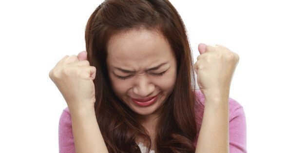Asian woman angry isolated