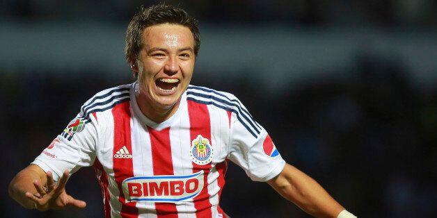 PUEBLA, MEXICO - MARCH 14: Erick Torres of Chivas celebrate after scoring the second goal of his team during a match between Puebla and Chivas as part of 10th round Clausura 2015 Liga MX at BUAP Olympic Stadium on March 14, 2015 in Puebla, Mexico. (Photo by Hector Vivas/LatinContent/Getty Images)