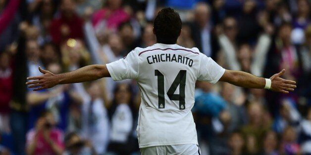 Real Madrid's Mexican forward Javier Hernandez celebrates after scoring a goal during the Spanish league football match Real Madrid CF vs SD Eibar at the Santiago Bernabeu stadium in Madrid on April 11, 2015. AFP PHOTO/ JAVIER SORIANO (Photo credit should read JAVIER SORIANO/AFP/Getty Images)