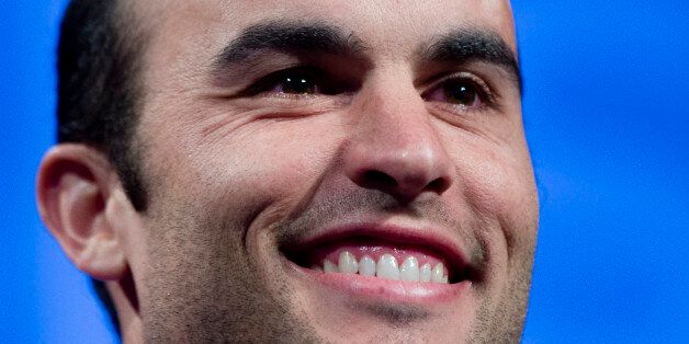 Retired soccer player Landon Donovan poses for photographs during a news conference ahead of the 2015 Major League Soccer SuperDraft, Thursday, Jan. 15, 2015, in Philadelphia. MLS announced that it has named its Most Valuable Player award after Donovan. (AP Photo/Matt Rourke)