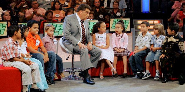 Mario Kreutzberger, 67, center, better known as Don Francisco interacts with young guests during the taping of his TV show Sabado Gigante in Miami, Tuesday, Sept. 16, 2008. Don Francisco has been the host Sabado Gigante since 1962, and his show is viewed in 44 countries around the world. (AP Photo/Alan Diaz)