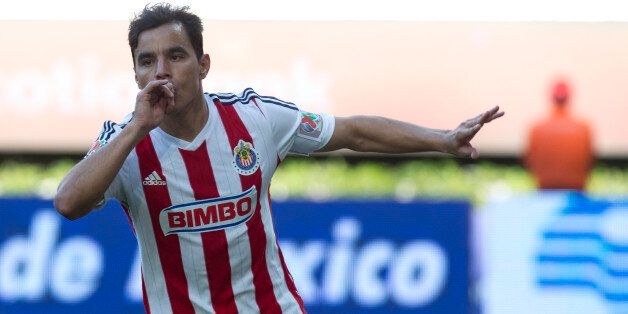 ZAPOPAN, MEXICO - MARCH 22: Omar Bravo of Chivas celebrates after scoring the first goal of his team during a match between Chivas and Toluca as part of 11th round of Clausura 2015 Liga MX at Omnilife Stadium on March 22, 2015 in Zapopan, Guadalajara, Mexico. (Photo by Refugio Ruiz/LatinContent/Getty Images)