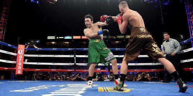 LOS ANGELES, CA - APRIL 18: Andrzej Fonfara punches Julio Cesar Chavez Jr. to a ninth round TKO to win the WBC light heavyweight title fight at StubHub Center on April 18, 2015 in Los Angeles, California. (Photo by Harry How/Getty Images)