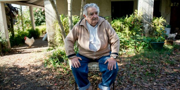Uruguay's President Jose Mujica sits outside his home during an interview on the outskirts of Montevideo, Uruguay, Friday, May 2, 2014. Mujica said Friday that his countryâs legal marijuana market will be much better than Coloradoâs, where he says the rules are based on âfictionâ and âhypocrisyâ because the state loses track of the drug once itâs sold and many people fake illnesses to get prescription weed. Mujica says this wonât be allowed in Uruguay, where the licensed and regulated market will be much less permissive with drug users. (AP Photo/Matilde Campodonico)