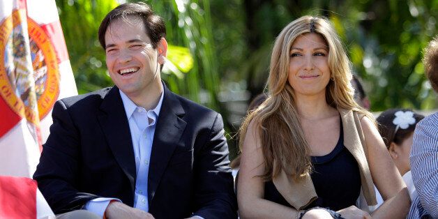 Marco Rubio, left, sits with his wife Jeanette before signing a document declaring his candidacy in the Florida GOP primary for the U.S. Senate in West Miami,. Fla. Tuesday, April 27, 2010. (AP Photo/Lynne Sladky)
