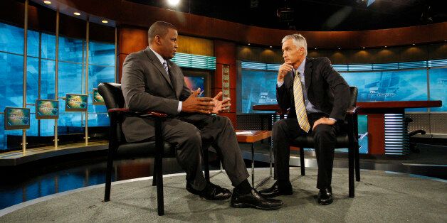 In this May 14 , 2010 photo, U.S. Rep. Kendrick Meek (D-Fla), left, is interviewed by Univision's Jorge Ramos on the Al Punto television show in Miami. Republic Senate candidate Marco Rubio may have a strong following among Cubans in Miami, but that doesn't necessarily mean he'll be an easy win among the state's Latino voters. Both of Rubio's opponents, Gov. Charlie Crist, who is running as an independent after Rubio's success forced him from the GOP, and the Democratic front-runner, Rep. Meek, oppose the Arizona law. Only Meek, a former Florida Highway Patrol trooper, has tried to make it an issue. (AP Photo/J Pat Carter)