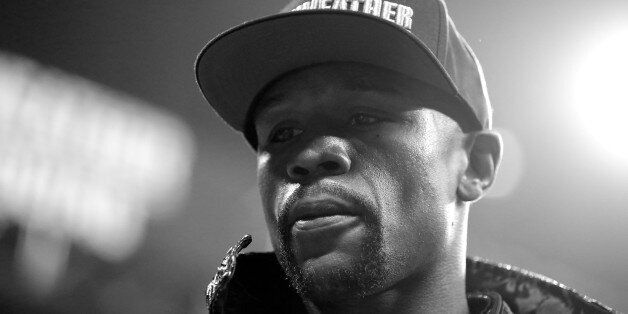 LAS VEGAS, NV - MAY 02: (EDITORS NOTE: Image has been converted to black and white.) Floyd Mayweather Jr. looks on before taking on Manny Pacquiao in their welterweight unification championship bout on May 2, 2015 at MGM Grand Garden Arena in Las Vegas, Nevada. (Photo by Al Bello/Getty Images)