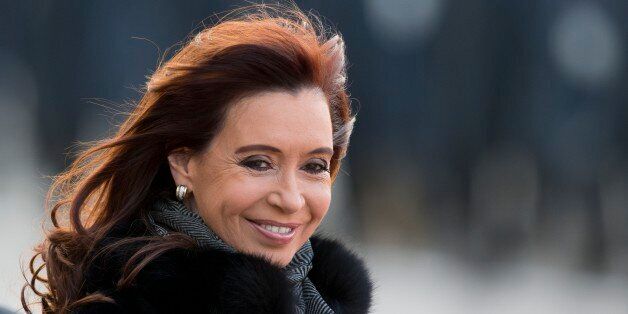 Argentina's President Cristina Fernandez smiles as he arrives at Vnukovo government airport outside Moscow, Russia, Tuesday, April 21, 2015. (AP Photo/Alexander Zemlianichenko)