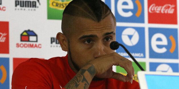 SANTIAGO, CHILE - JUNE 17: Arturo Vidal of Chile cries during a press conference at Complejo Deportivo Juan Pinto Duran to declare after being involved in an accident while he was driving drunk on June 17, 2015 in Santiago, Chile. (Photo by Claudio Santana/LatinContent/Getty Images) 