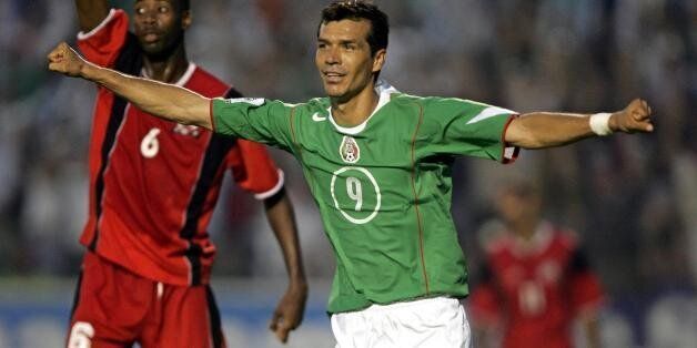 Mexican Jared Borgetti celebrates scoring against Trinidad&Tobago during their FIFA World Cup Germany 2006 Concacaf qualifying round match in Monterrey, 08 June 2005. AFP PHOTO/OMAR TORRES (Photo credit should read OMAR TORRES/AFP/Getty Images)