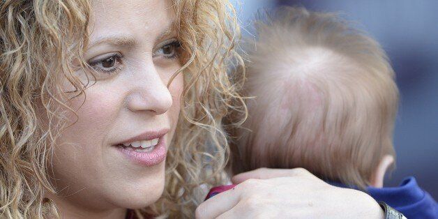 Colombian singer Shakira holds her son Sasha before the Spanish league football match FC Barcelona v Valencia CF at the Camp Nou stadium in Barcelona on April 18, 2015. AFP PHOTO / JOSEP LAGO (Photo credit should read JOSEP LAGO/AFP/Getty Images)