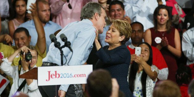 MIAMI, FL - JUNE 15: Former Florida Governor Jeb Bush greets his wife Columba Bush after announcing his plan to seek the Republican presidential nomination during an event at Miami-Dade College - Kendall Campus on June 15 , 2015 in Miami, Florida. Bush joins a list of Republican candidates to announce their plans on running against the Democrats for the White House. (Photo by Joe Raedle/Getty Images)