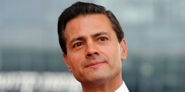 Mexican President Enrique Pena Nieto, looks on during a visit at the Villa Mediterranee, in Marseille, southern France, Wednesday, July 15.(AP photo/Claude Paris)