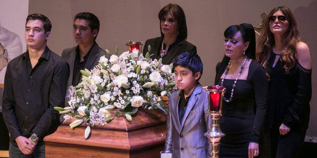 MEXICO CITY, MEXICO - JULY 16: Lucia Mendez (3L), Ana Barbara (3R), and Maribel Guardia (2R) stand guard by the coffin of Joan Sebastian during a funeral ceremony organized by Sociedad de Autores y Compositores de Mexico at Centro Cultural Roberto Cantoral on July 16, 2015 in Mexico City, Mexico. (Photo by Manuel Velasquez/LatinContent/Getty Images)