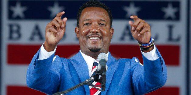 National Baseball Hall of Fame inductee Pedro Martinez speaks during an induction ceremony at the Clark Sports Center on Sunday, July 26, 2015, in Cooperstown, N.Y. (AP Photo/Mike Groll)