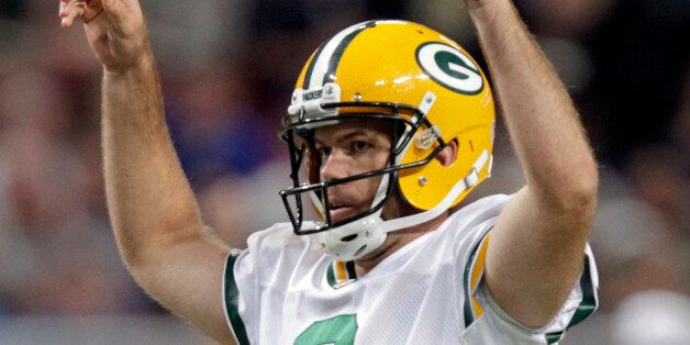 Green Bay Packers kicker Mason Crosby celebrates after booting a 30-yard field goal during the third quarter of an NFL football game against the St. Louis Rams, Saturday, Aug. 17, 2013, in St. Louis. (AP Photo/Tom Gannam)