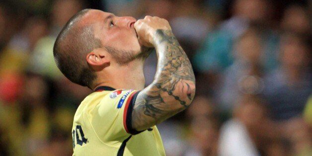 Dario Benedetto of America celebrates his goal against Santos during their Mexican Apertura 2015 tournament football match at the TSM Corona stadium in Torreon, Coahuila State, Mexico, on August 14, 2015. AFP PHOTO / CARLOS RAMIREZ (Photo credit should read CARLOS RAMIREZ/AFP/Getty Images)