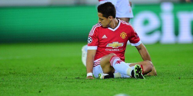 Manchester United's Javier Hernandez reacts after falling while shooting a penalty and missing it during the UEFA Champions League playoff football match between Club Brugge and Manchester United at Jan Breydel Stadium in Bruges, August 26, 2015. AFP PHOTO / EMMANUEL DUNAND (Photo credit should read EMMANUEL DUNAND/AFP/Getty Images)