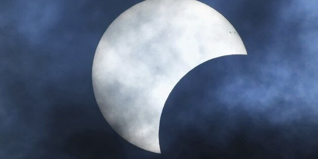 Partial Solar Eclipse on a Cloudy Day 03.11.2013