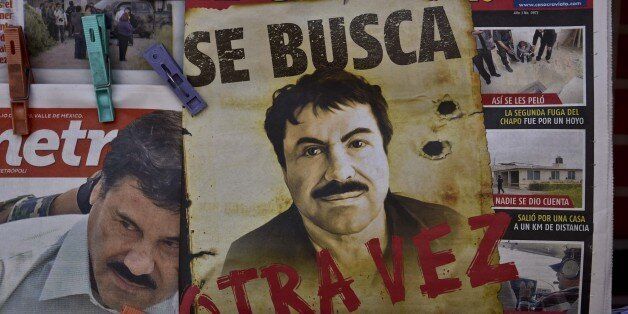 A poster with the face of Mexican drug lord Joaquin 'El Chapo' Guzman, reading 'Wanted, Again', is displayed at a newsstand in one Mexico City's major bus terminals on July 13, 2015, a day after the government informed of the escape of the drug kingpin from a maximum-security prison. Mexican security forces scrambled Monday to save face and recapture 'El Chapo' as authorities investigated whether guards helped him escape prison through a tunnel under his cell. AFP PHOTO / YURI CORTEZ (Photo credit should read YURI CORTEZ/AFP/Getty Images)