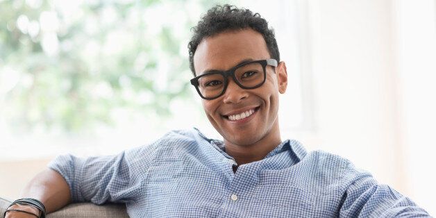 USA, New Jersey, Jersey City, Portrait of young relaxed man smiling