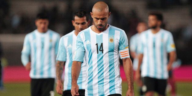 Argentina's Javier Mascherano (14) leaves the field at the end of a 2018 Russia World Cup qualifying soccer match against Ecuador in Buenos Aires, Argentina, Thursday, Oct. 8, 2015. Argentina lost the match 0-2. (AP Photo/Santiago Filipuzzi)