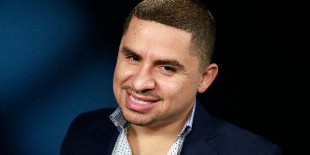 FILE - This Aug. 6, 2014 photo shows Mexican singer Larry Hernandez posing for a photo during an interview in Los Angeles. Hernandez was promoting his new album âOtra Vez en la Lista Negra,â (On the Blacklist Again) and his reality TV show, âLarrymania.â (AP Photo/Richard Vogel, File)