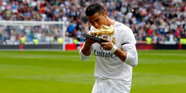 MADRID, SPAIN - OCTOBER 17:Cristiano Ronaldo of Real Madrid salutes with his Golden Shoe award during the La Liga match between Real Madrid CF and Levante UD at Estadio Santiago Bernabeu on October 17, 2015 in Madrid, Spain. (Photo by Antonio Villalba/Real Madrid via Getty Images)