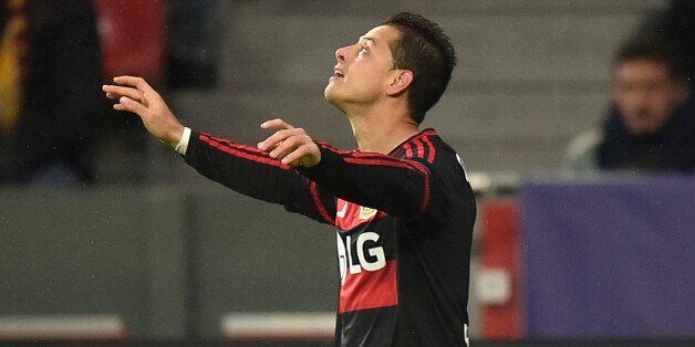 Leverkusen's Javier Hernandez celebrates after scoring the opening goal during the Champions League group E soccer match between Bayer Leverkusen and AS Roma in Leverkusen, Germany, Tuesday, Oct. 20, 2015. (AP Photo/Martin Meissner)