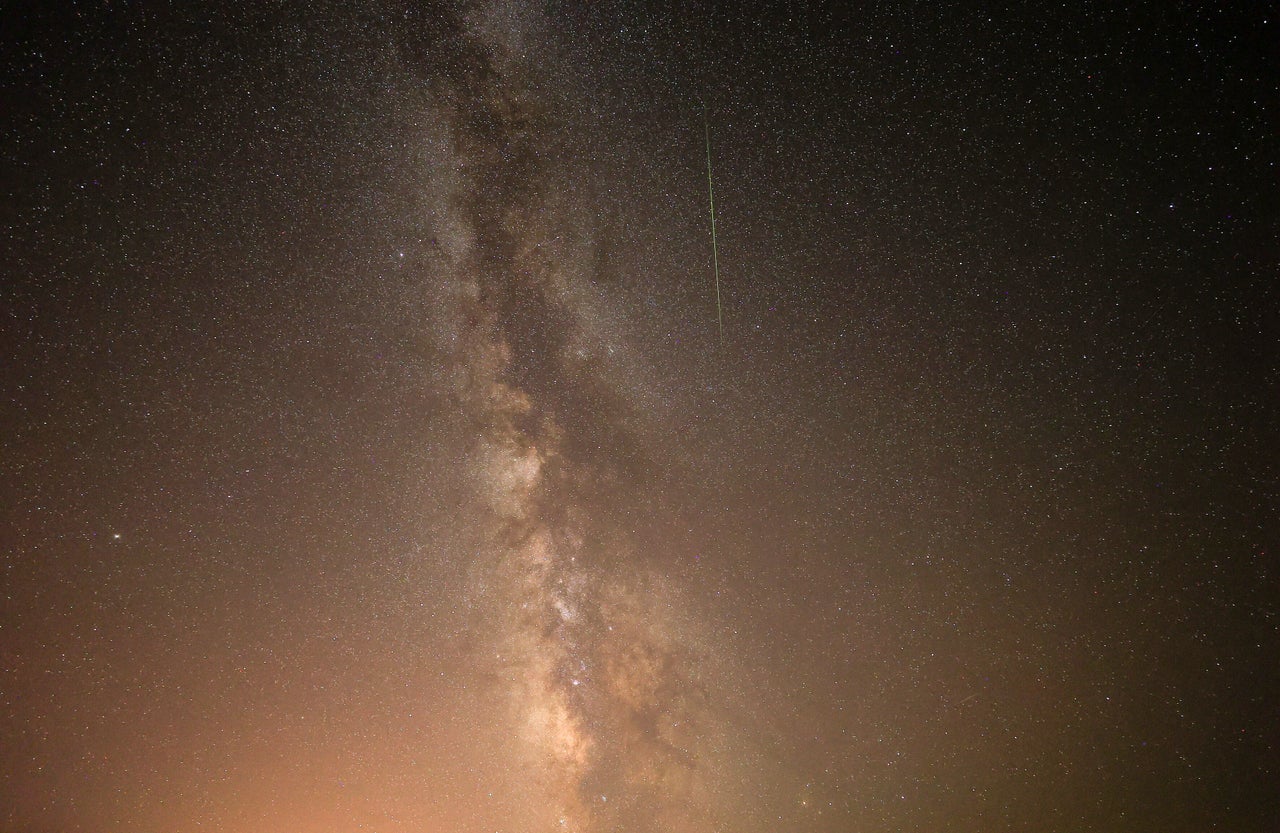 A Perseid meteor streaks across the night sky over Izmir, Turkey on August 13, 2021