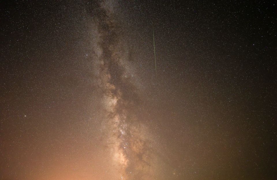 A Perseid meteor streaks across the night sky over Izmir, Turkey on August 13,