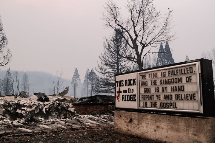The remains of a burned church destroyed by the Dixie Fire is situated along Highway 89 on Aug. 8, 2021 in Greenville, California. 
