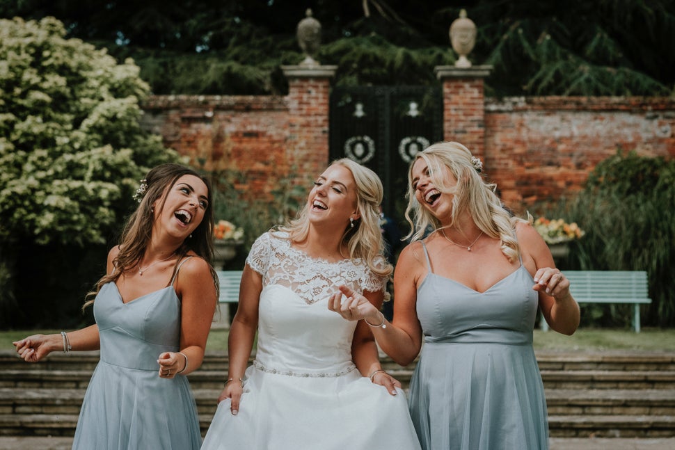 Francesca Jones dancing with her sisters at her wedding in Irnham, Lincolnshire, in July 2017.