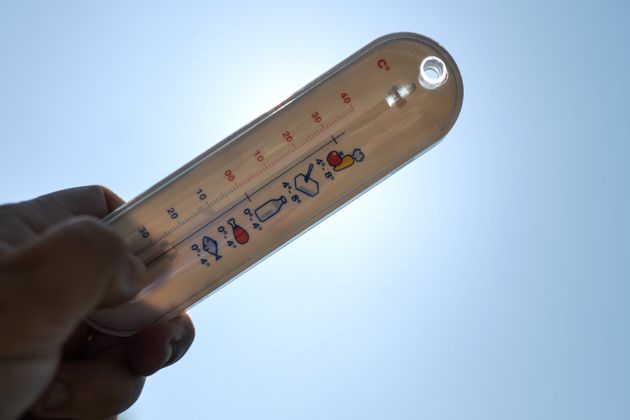 Thermometer displays a temperature close to 35° C in the sun. 
On Wednesday, July 21, 2021, in Bayeux, Calvados, Normandy, France. (Photo by Artur Widak/NurPhoto via Getty Images)