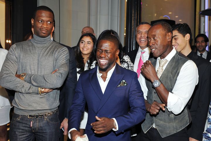 Kevin Hart (center) and Don Cheadle (right) pictured at the opening of the Audemars Piguet Boutique on Rodeo Drive in Beverly Hills, California, on Dec. 9, 2015.