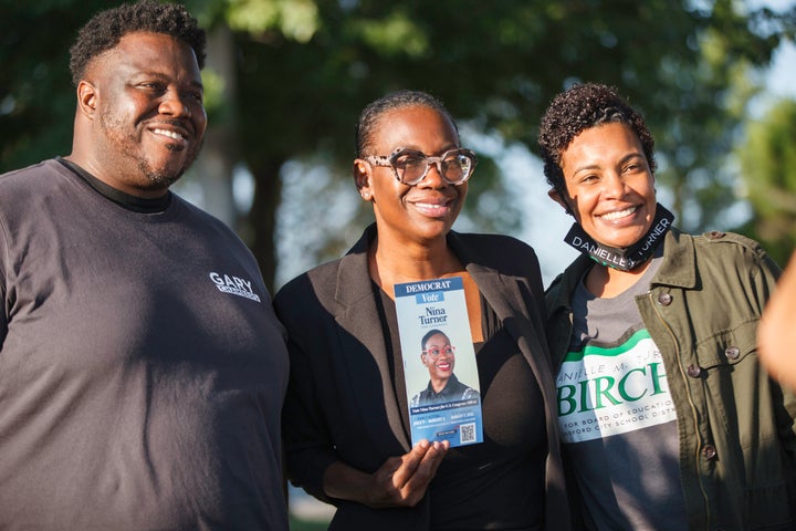 Nina Turner, center, campaigns in the Cleveland suburb of Oakwood. Politics experts believe she spent far too little of her b