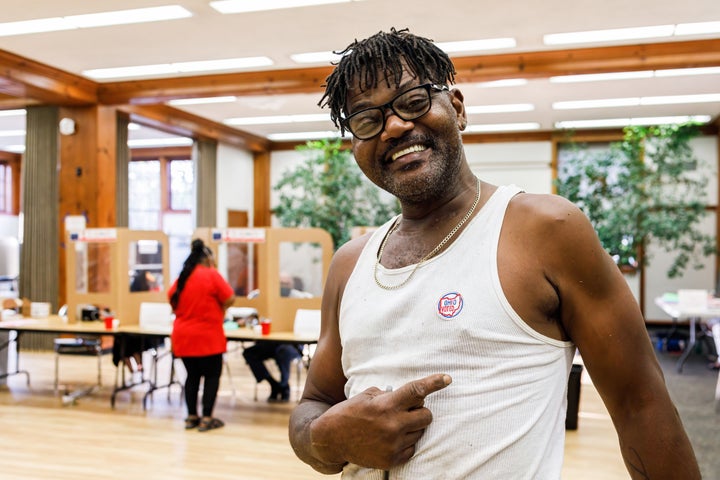 A voter in Shaker Heights, Ohio, proudly displays a sticker saying he voted. Turner believes that depictions of her as an "an