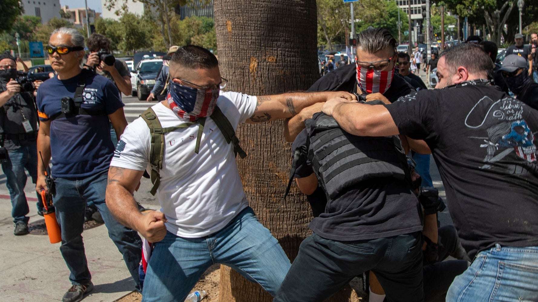 Man Stabbed, 2 Reporters Attacked As Violence Erupts At Los Angeles Anti-Vaxx Rally