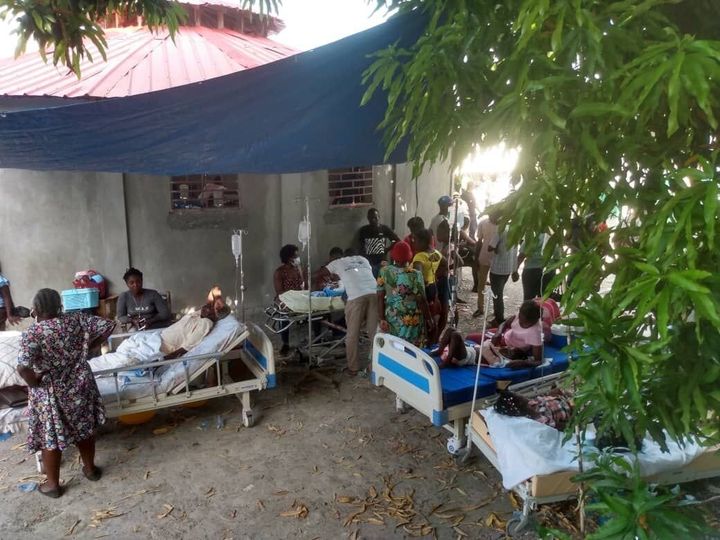 JEREMIE, HAITI - AUGUST 14: Injured people are treated in a field hospital after a 7.2 magnitude earthquake struck the country on August 14, 2021, in Jeremie, Haiti. The earthquake's epicenter was 12 kilometers (7.5 miles) northeast of Saint-Louis-du-Sud, with a depth of 10 kilometers (6 miles). (Photo by Stringer/Anadolu Agency via Getty Images)