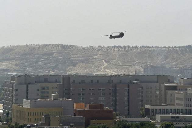 A US military helicopter is pictured flying above the US embassy in
