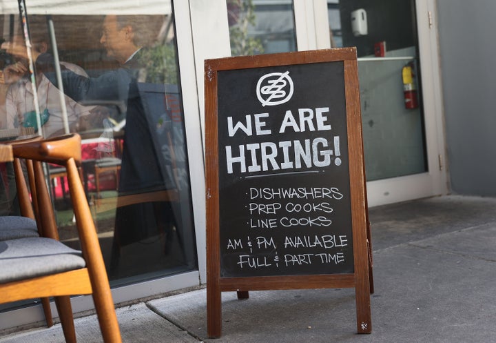 A hiring sign in front of the Buya restaurant in Miami, Florida, in March.