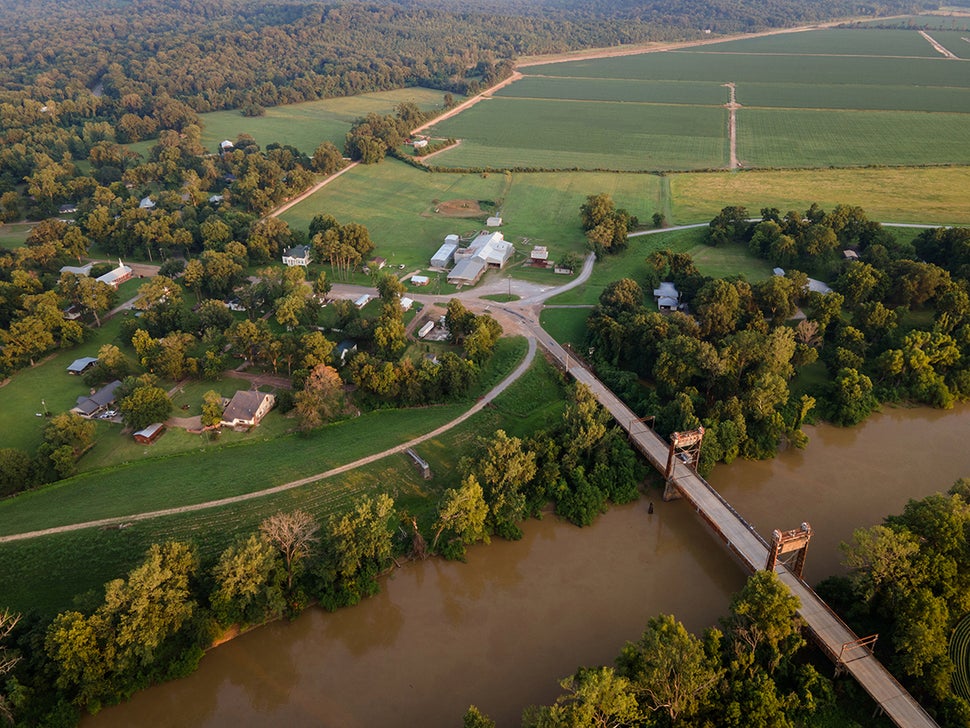 The sun sets on the village of Satartia alongside the Yazoo River in July. <br /><strong>Rory Doyle for HuffPost</strong>