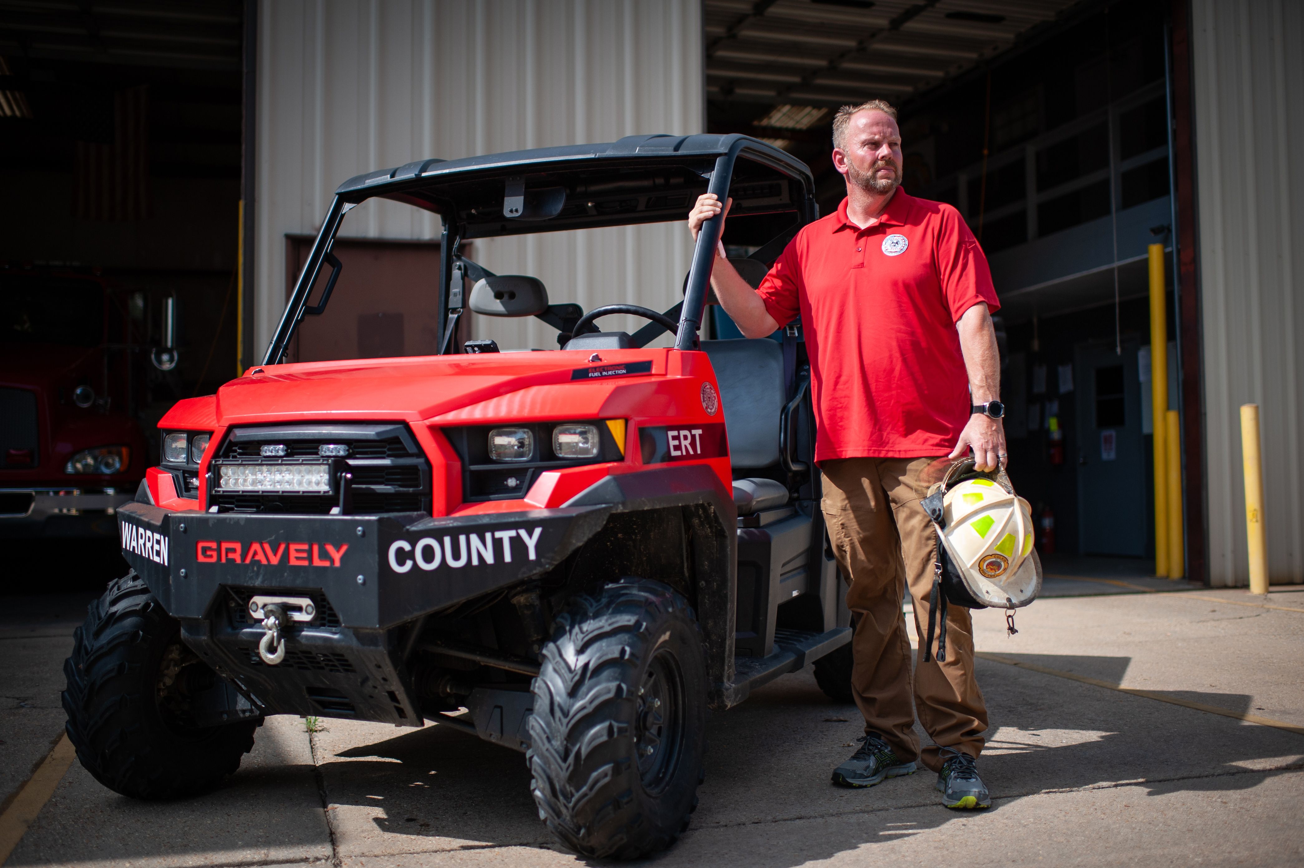 Warren County firefighter Jerry Briggs in July with the utility task vehicle he used during the February 2020 gas leak in Satartia.<br><strong>Rory Doyle for HuffPost</strong>