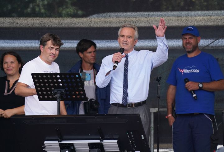 Robert F. Kennedy Jr. (center) speaks at a rally against COVID-19 restrictions in Berlin in August 2020. 