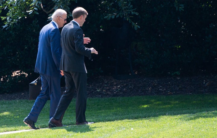 President Joe Biden walks with national security adviser Jake Sullivan to the Oval Office on July 27. Sullivan said Tues